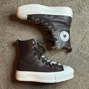 Brown leather Converse All Star high tops